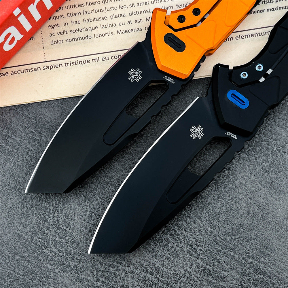 Two open tactical folding knives with black blades. The top knife features an orange handle, while the bottom knife has a black handle with a blue pivot button.