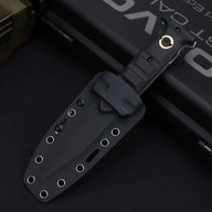 A closed black folding knife with a gold pivot screw, sheathed inside a black hard sheath with multiple eyelets, displayed on a dark background.
