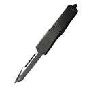 A black OTF knife with a tanto blade and black hardware, displayed on a white background.