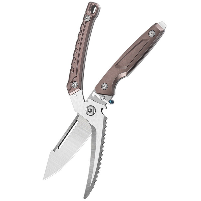 An open folding knife with a bronze skeletonized handle and two silver blades, one featuring a serrated edge, displayed on a white background.
