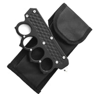 A closed black knuckle duster OTF knife with textured grooves, displayed next to its black nylon carrying sheath on a white background.