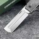 A close-up of the silver tanto blade and edge on a CRKT folding knife, with the engraved CRKT logo clearly visible.
