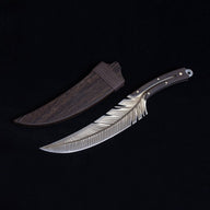 A custom fixed blade knife with a silver feather-patterned blade and dark wood handle, displayed next to its dark wooden sheath against a black background.