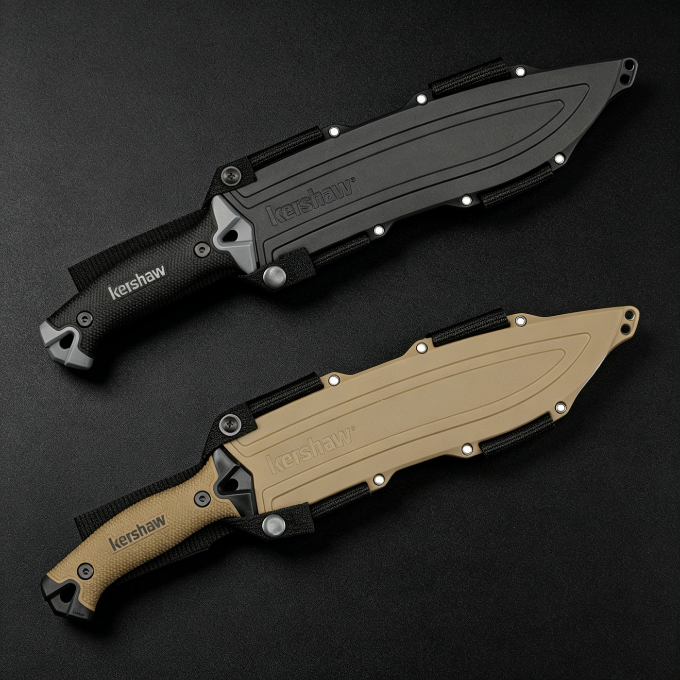 Two Kershaw fixed blade knives with textured handles and molded sheaths; the top knife is black and the bottom knife is tan, displayed on a dark surface.