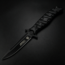 An open Noks folding knife with a black textured handle and a silver blade, displayed on a dark background.