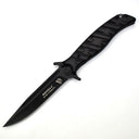 An open Noks folding knife with a black handle and a silver blade, displayed on a white background.