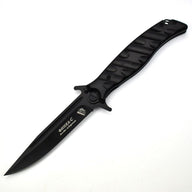 An open Noks folding knife with a black handle and a silver blade, displayed on a white background.