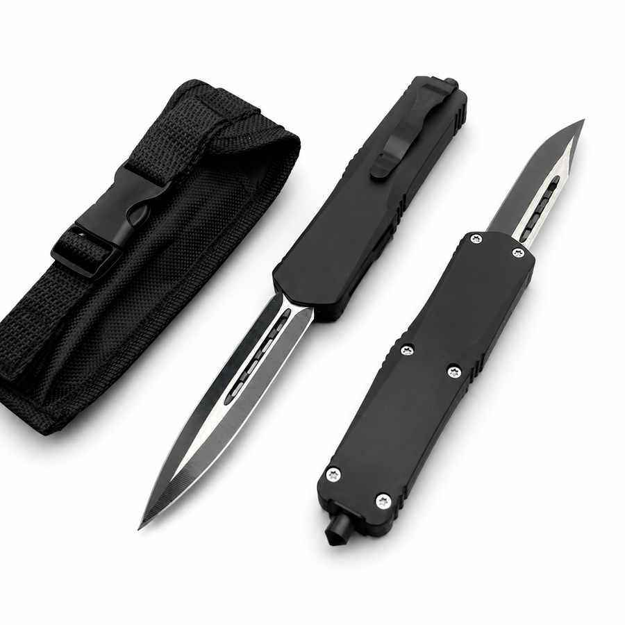 Two black OTF knives with carbon fiber handles and silver blades, displayed next to a black nylon sheath.