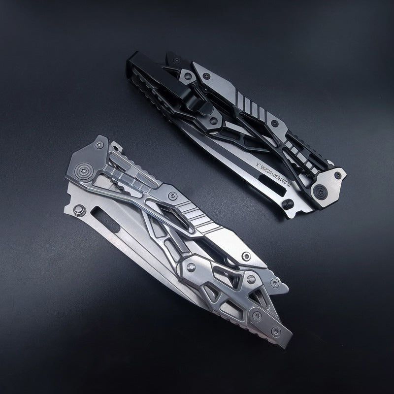 Two closed tactical folding knives, one silver and one black, showcasing the skeletonized handle frames and pocket clips, displayed on a dark background.