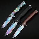 Three different EDC folding knives displayed on a black background, featuring colorful Damascus/Titanium patterned blades and handles in shell, matte black, and dark wood finishes.