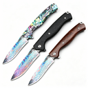 Three folding knives with different handle materials displayed on a white background, showcasing stunning rainbow-colored Damascus/Titanium blades, perfect for EDC outdoor carry and collection.